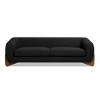 Divano imbottito Sherpa da 229 cm, Bouclé oversize, gambe in rovere naturale